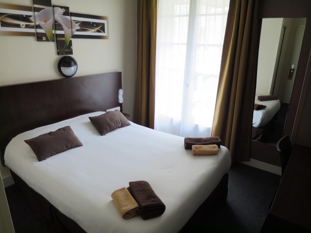 Hotel de la Paix Caen Habitación foto